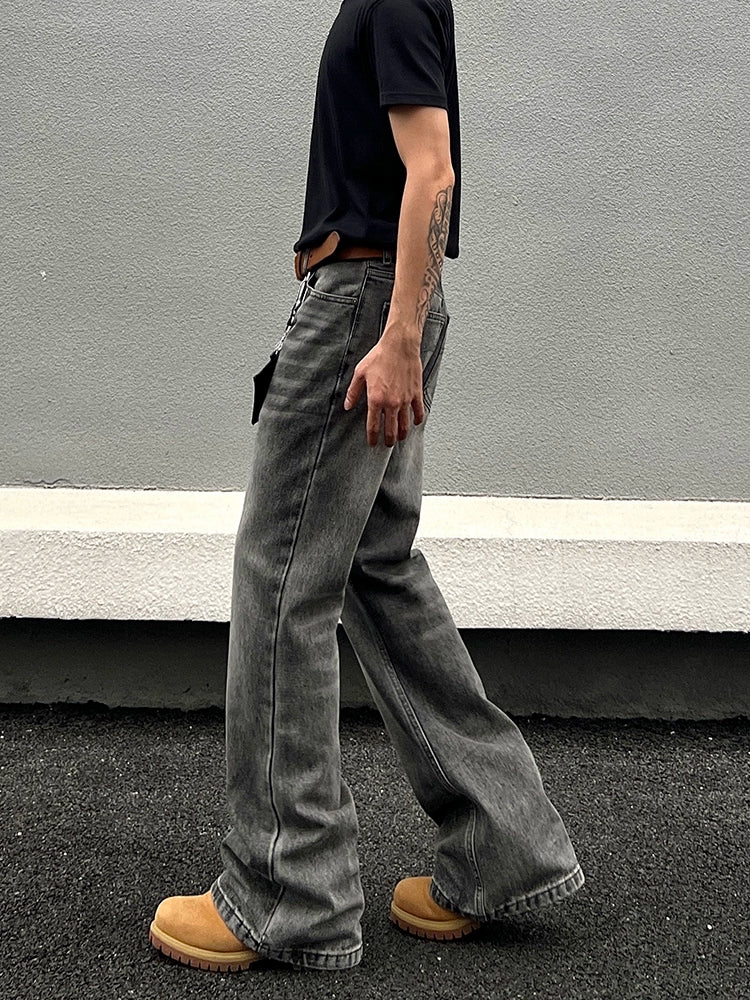 Jeans rectos acampanados desgastados 