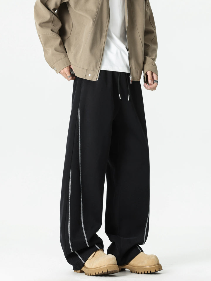 Pantaloni sportivi a gamba larga con cuciture visibili 