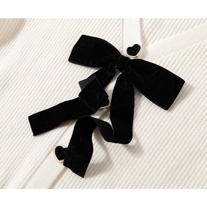 Cárdigan de punto con cuello en V y dobladillo con volantes 