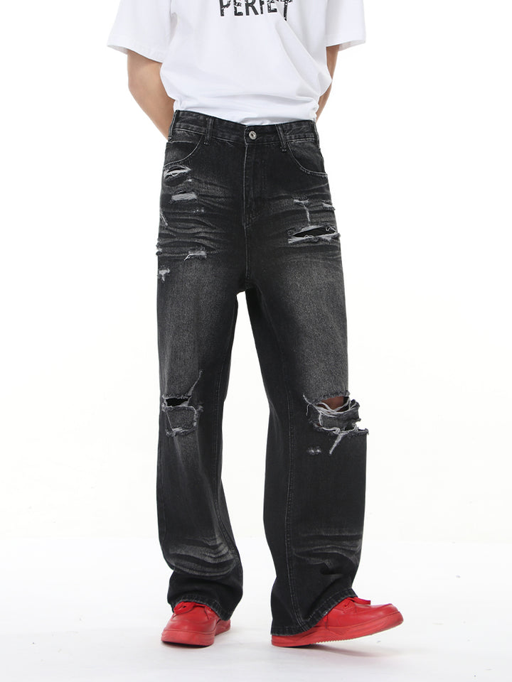 Pantalones de mezclilla anchos desgastados retro 