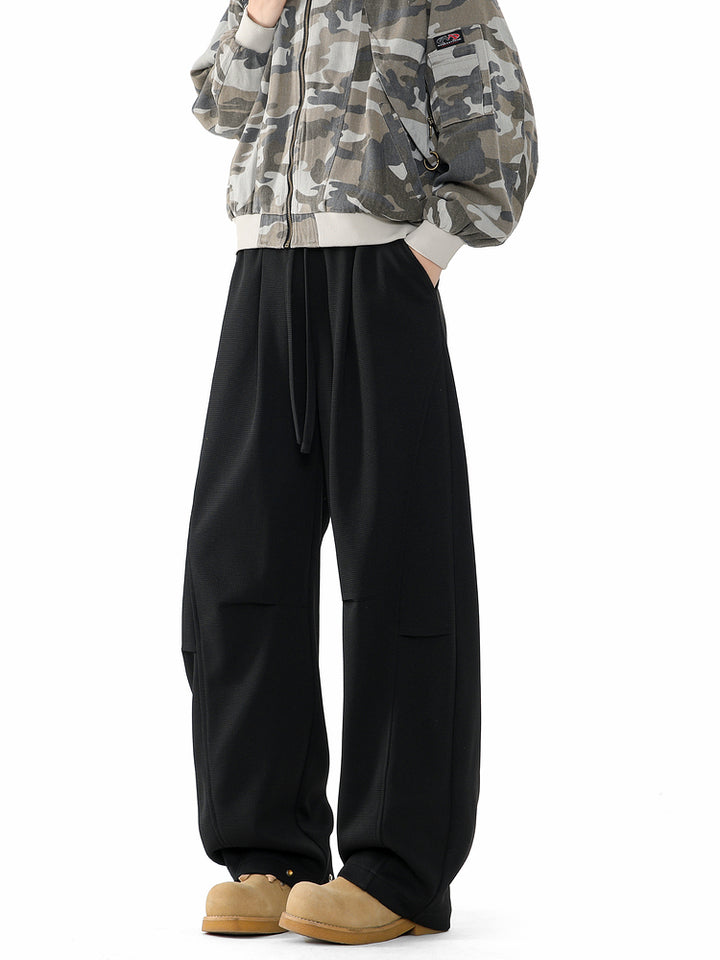 Pantaloni da tuta larghi e svasati retro 