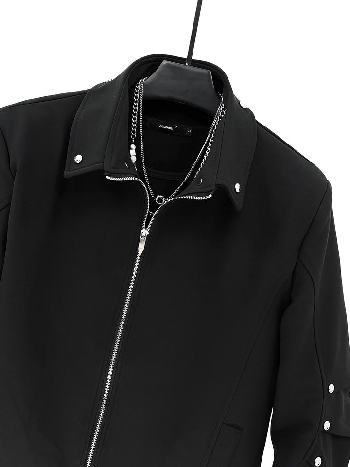 Chaqueta corta con mangas plisadas y remaches 