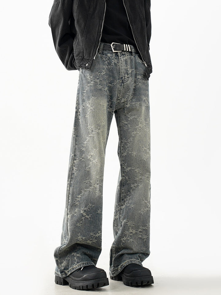 Pantalones de mezclilla acampanados desgastados retro 
