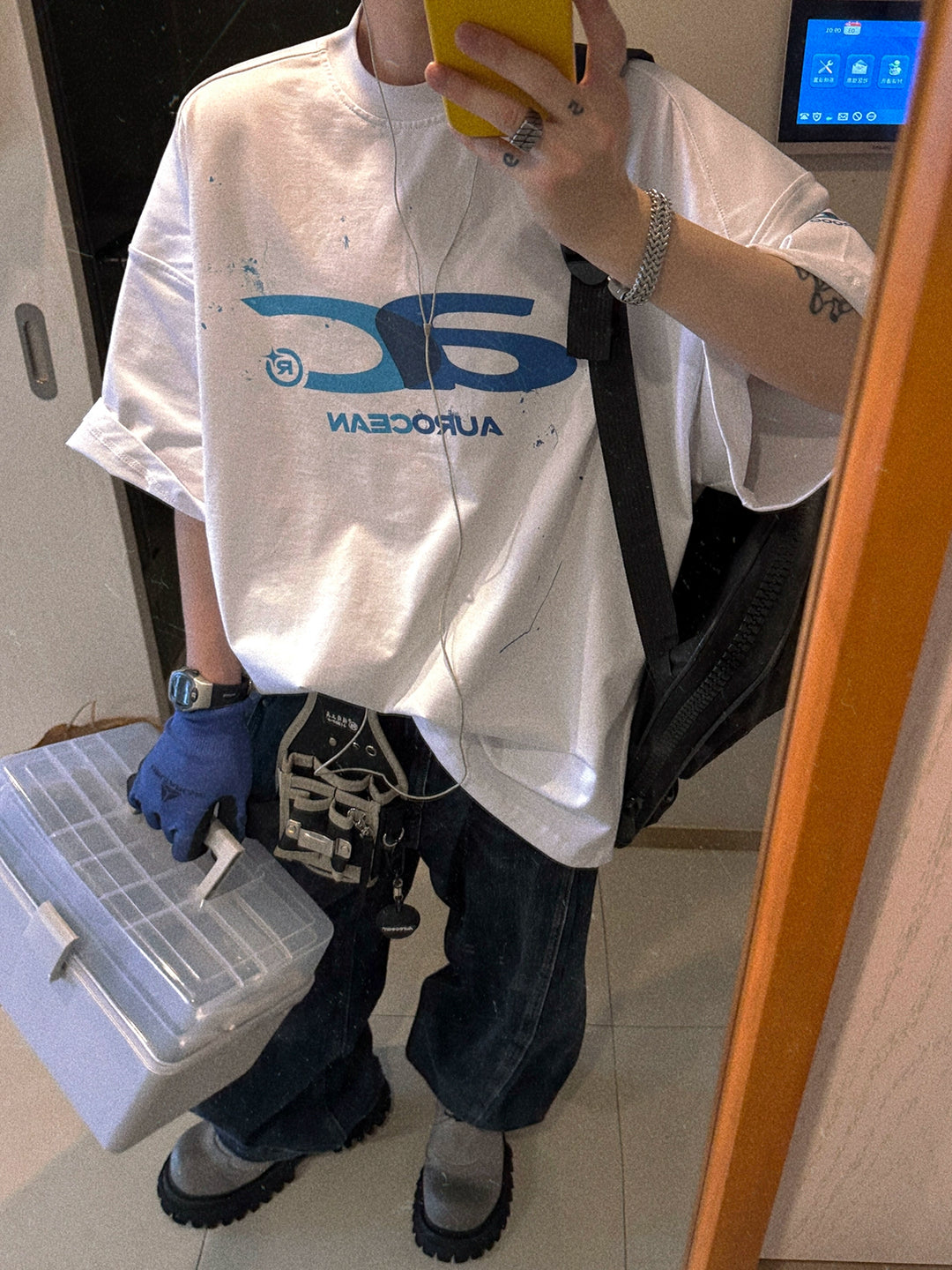 T-shirt a maniche corte in cotone pesante con grafica oversize 