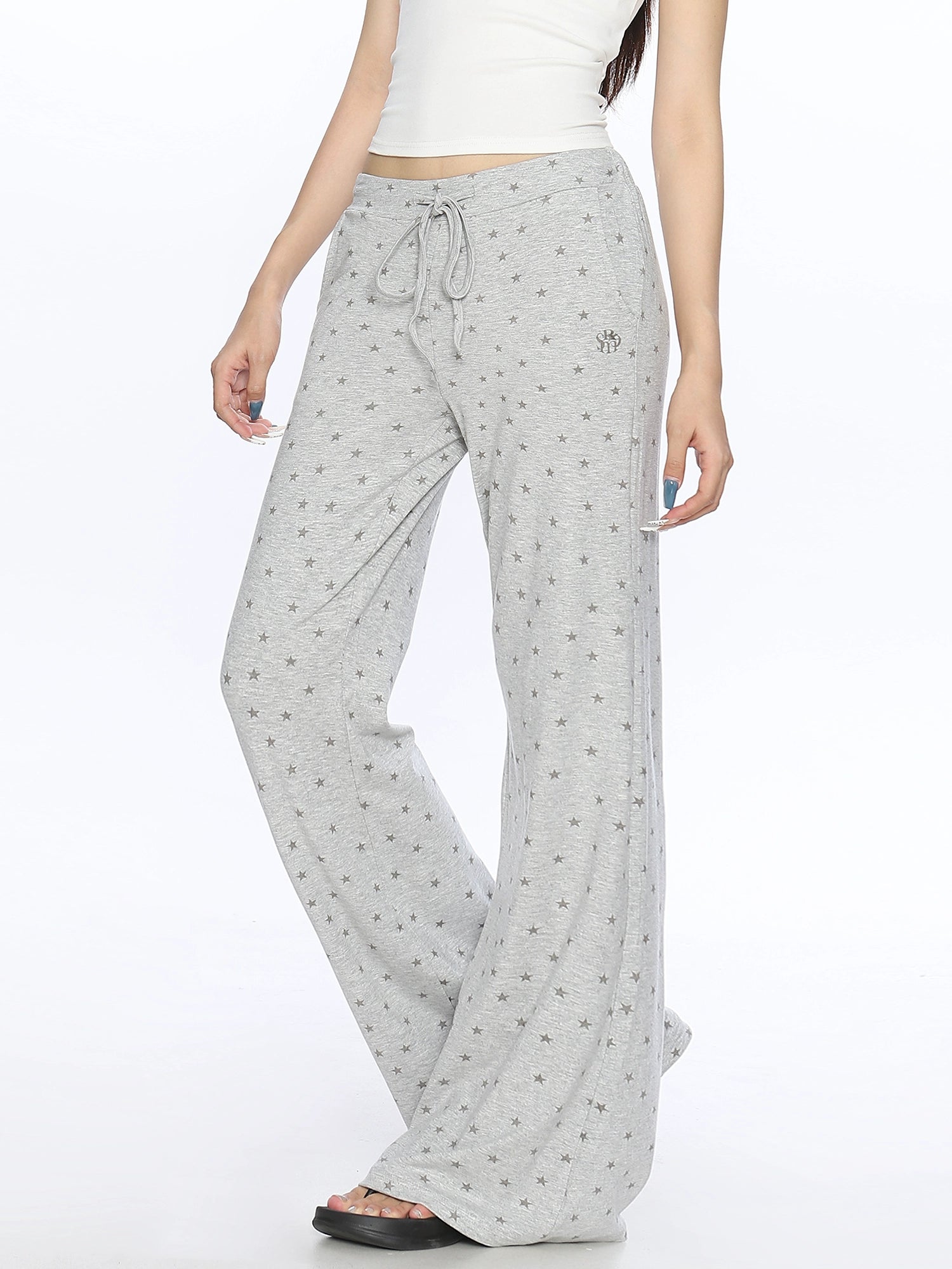 Pantaloni casual a campana con stampa a stelle 