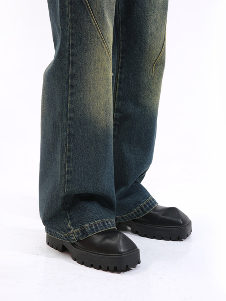 Jeans acampanados de cintura media desgastados vintage 