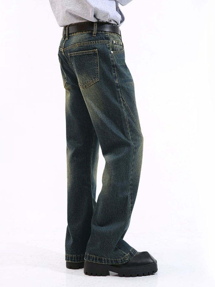 Jeans acampanados de cintura media desgastados vintage 