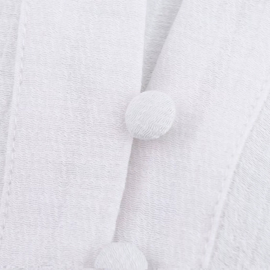 Chemise courte à boutons sur le devant avec broderie creuse 