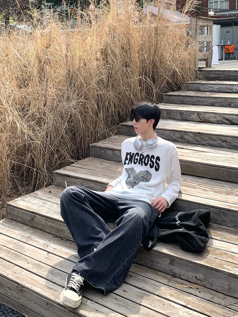 جينز كاجوال واسع الساق بمظهر ممزق 