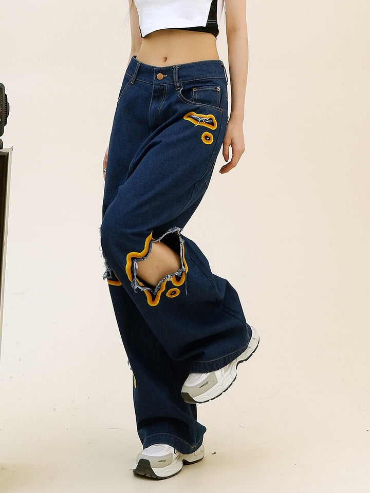 Spodnie uliczne z szerokimi nogawkami w stylu distressed 