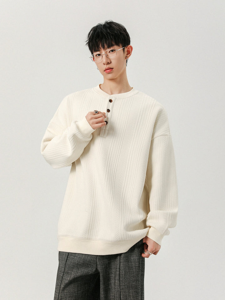 Camiseta de manga larga Henley de jacquard texturizado 