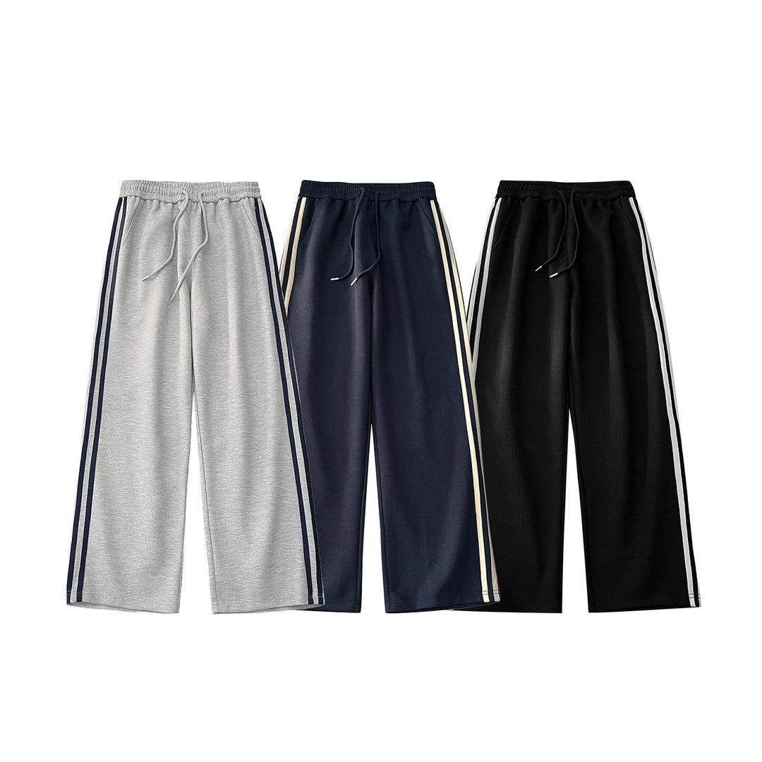 Pantaloni sportivi a gamba larga a righe retro 