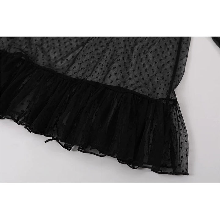 Polka Dot Mesh Ruffle Hem Turtleneck Top