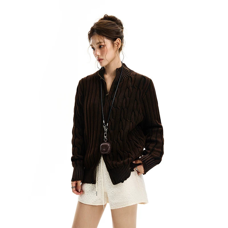 Pull en maille torsadée usé à zip 