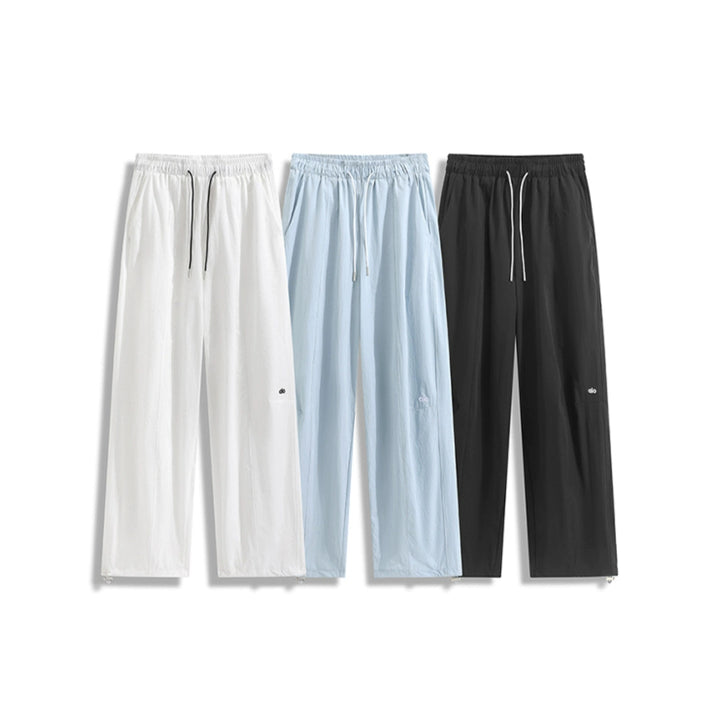 Pantalones casuales de pierna ancha sueltos de secado rápido 