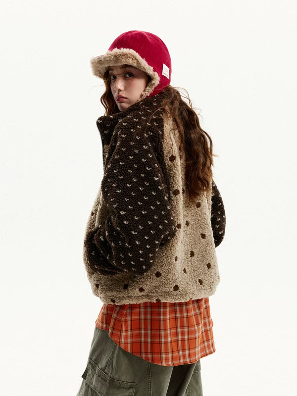 Giacca in pile con colletto alto a pois 