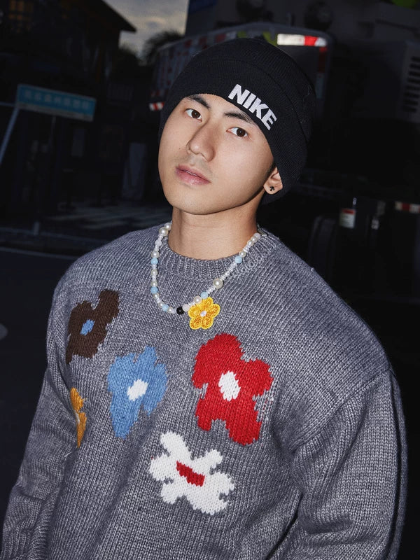 Pull en laine tricoté à motif floral 