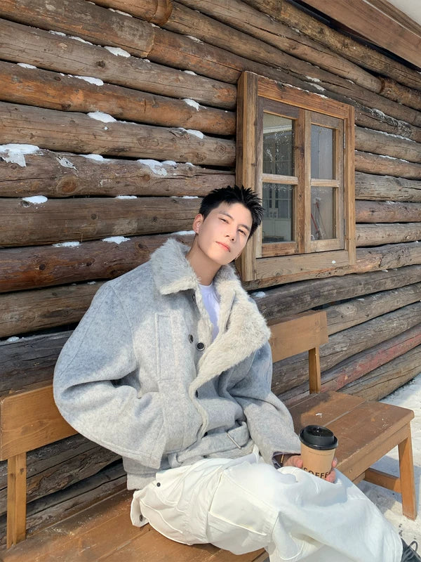 Dubbelt knäppt ulljacka med slagkrage 