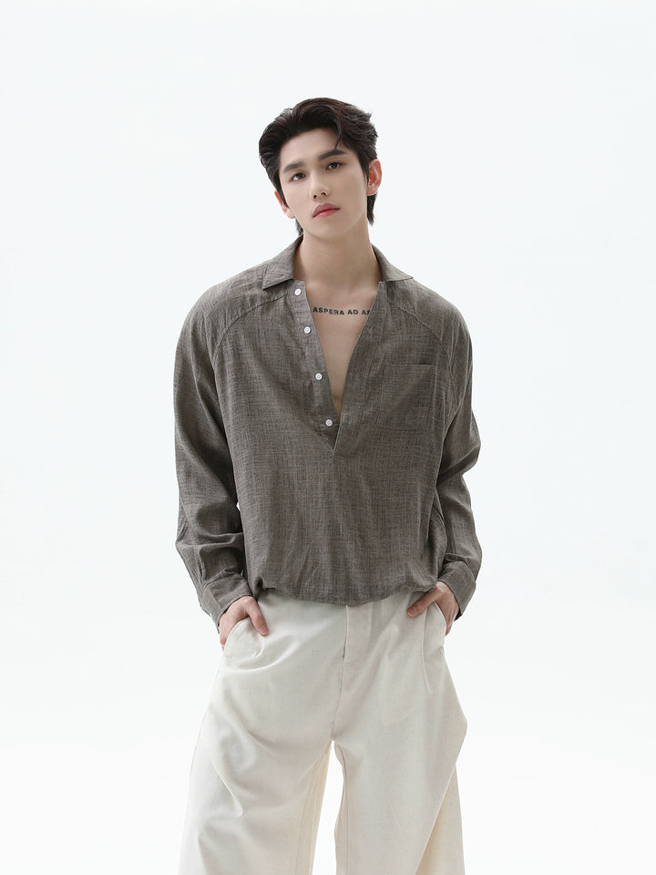 Chemise à boutons à manches raglan en lin avec col en V 