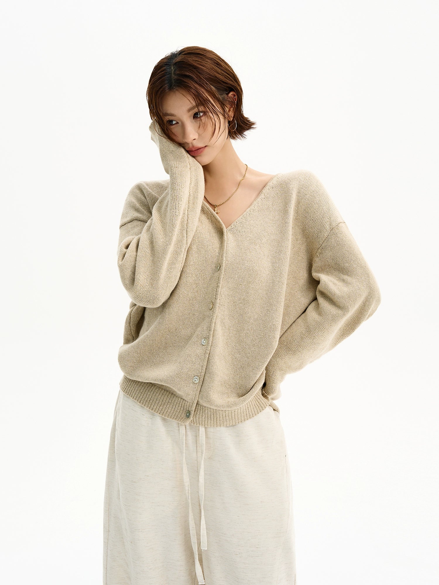 Cardigan in maglia di lino con scollatura a V 