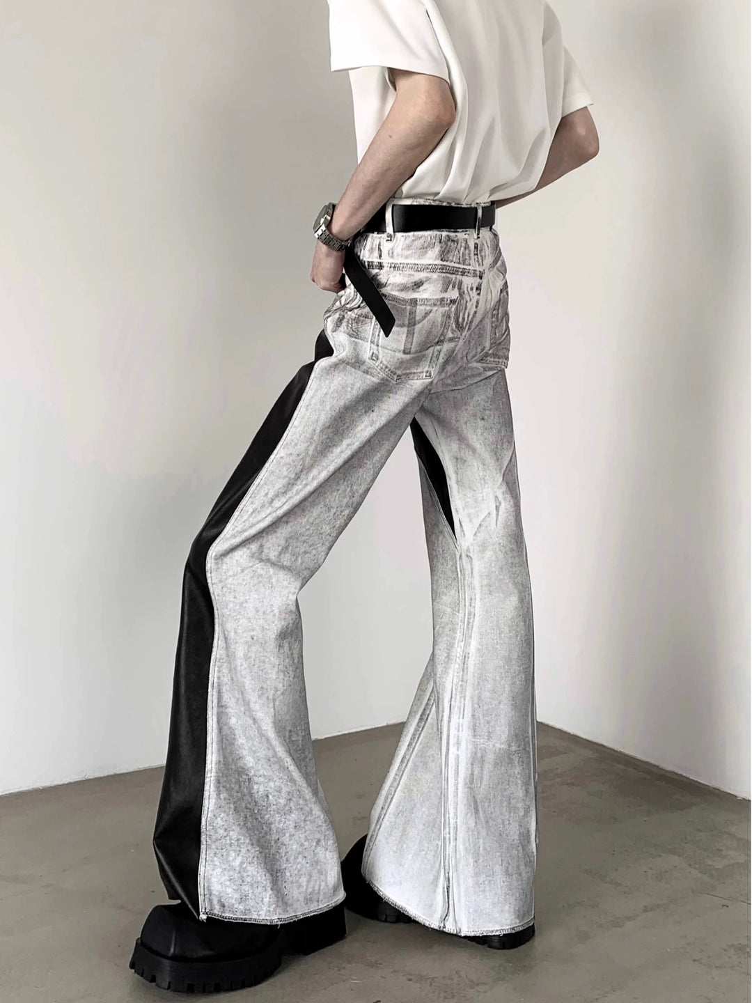 Gestreifte Patchwork Flared Lederjeans 