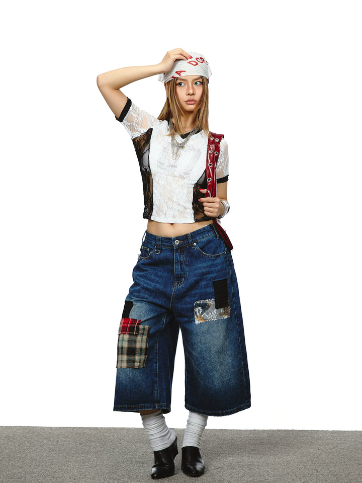 Top corto con scollo a V in pizzo trasparente 