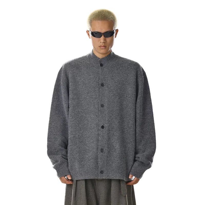 Rundhalslös stickad cardigantröja 