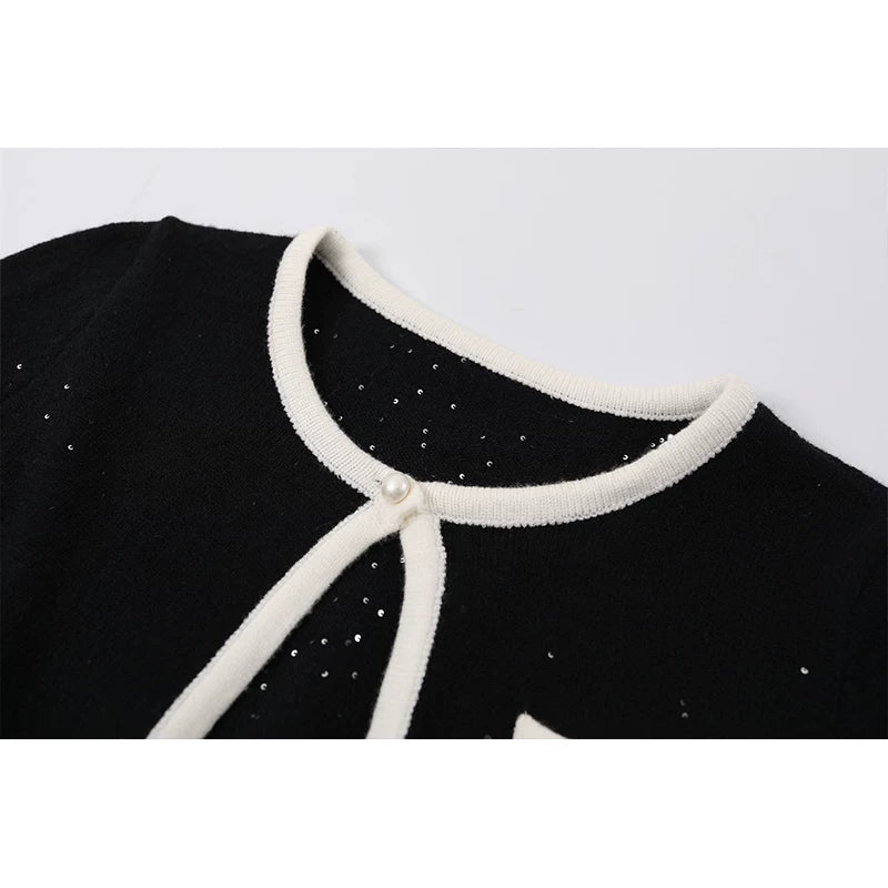 طقم سترة محبوكة وفستان قصير 