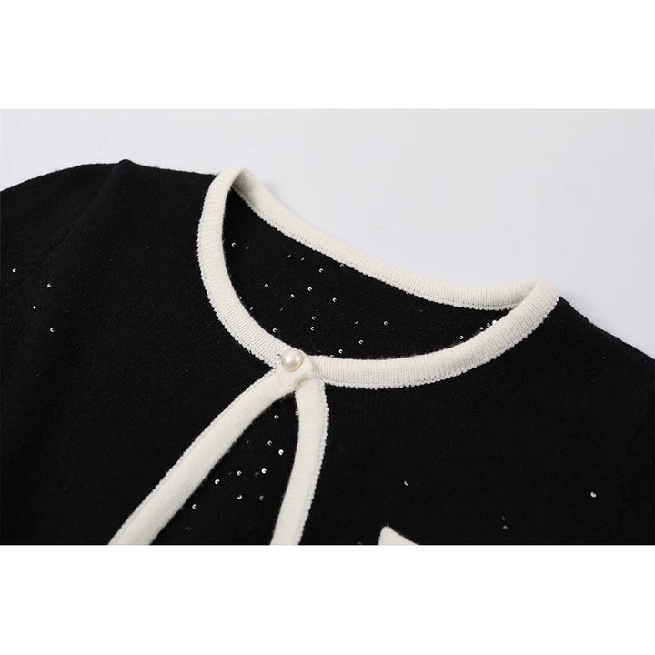 طقم سترة محبوكة وفستان قصير 