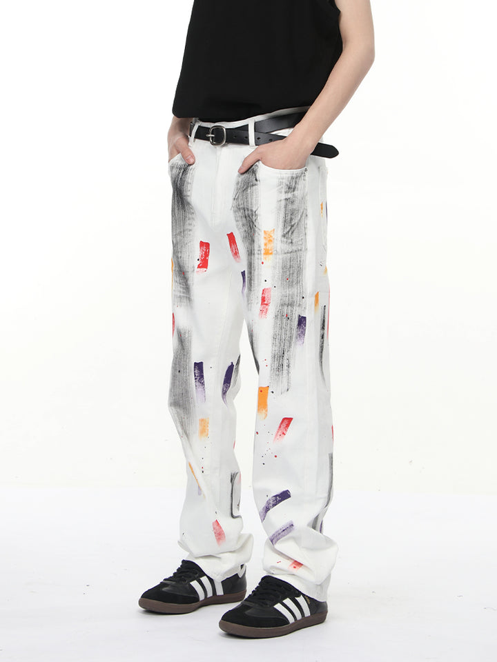 Pantalons droits déchirés en denim graffiti 