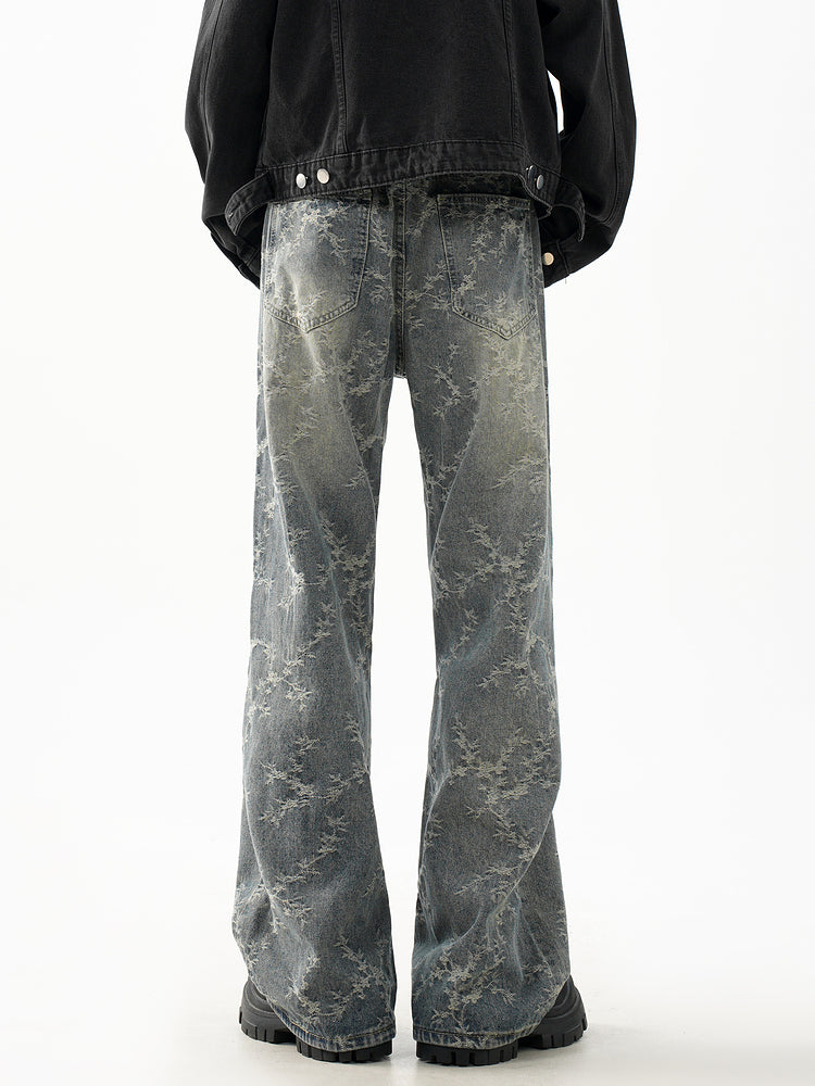 Pantalones de mezclilla acampanados desgastados retro 