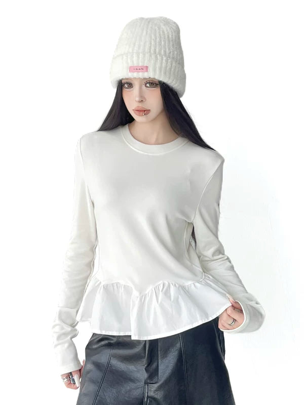 Top a maniche lunghe con peplum arruffato 