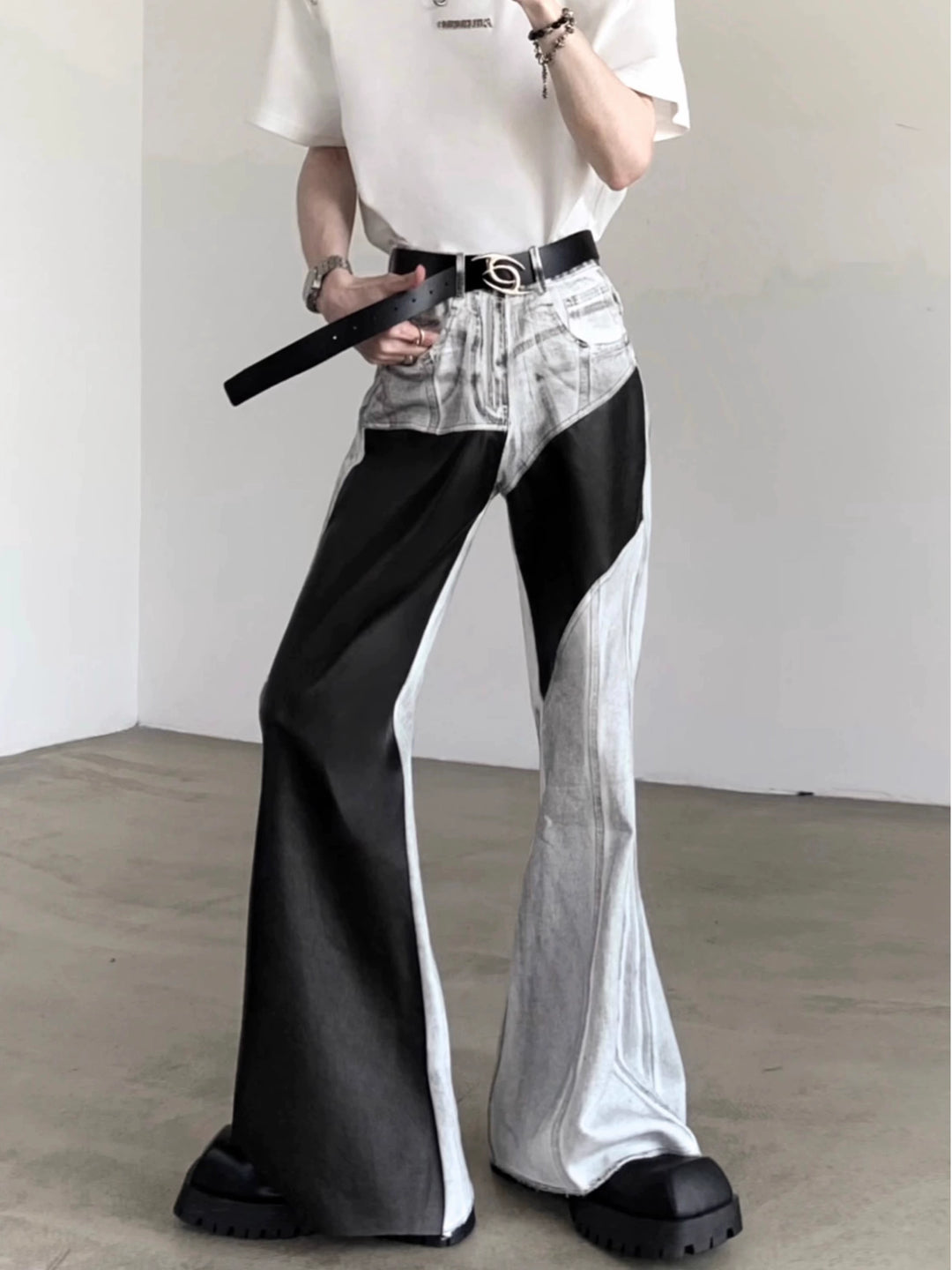 Gestreifte Patchwork Flared Lederjeans 