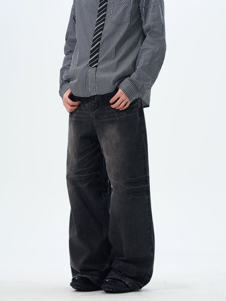 Jeans rectos de corte holgado desgastados 