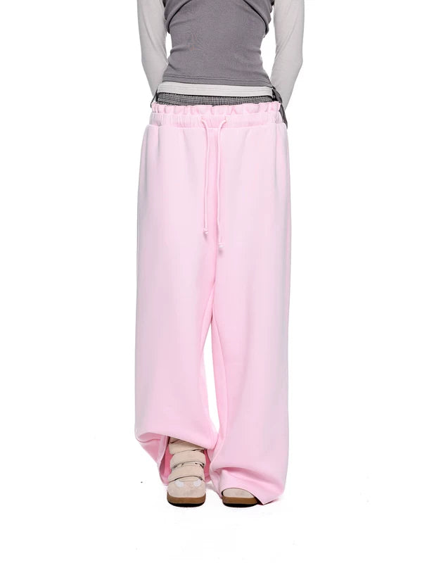 Pantaloni sportivi larghi con vita regolabile 