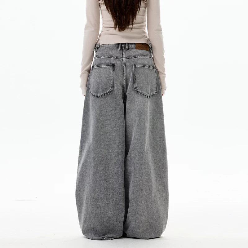 Jeans plissés à taille ajustable et jambes larges 