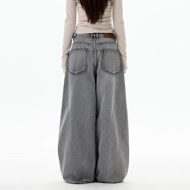 Jeans plissés à taille ajustable et jambes larges 