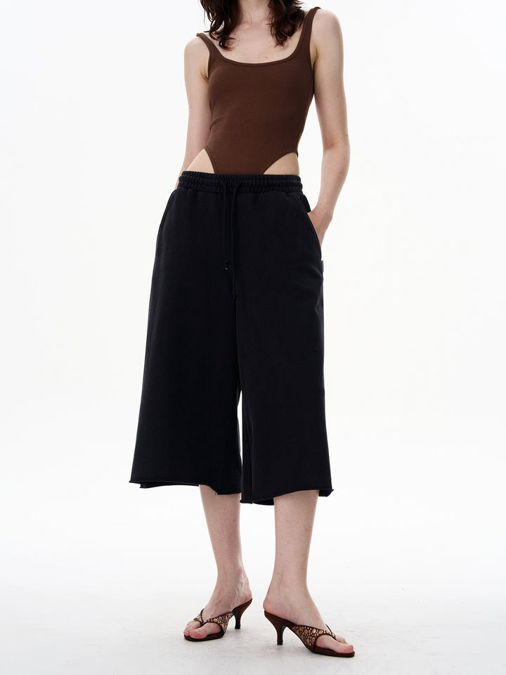 Pantalones cortos de sudadera de siete puntos sueltos Drape 