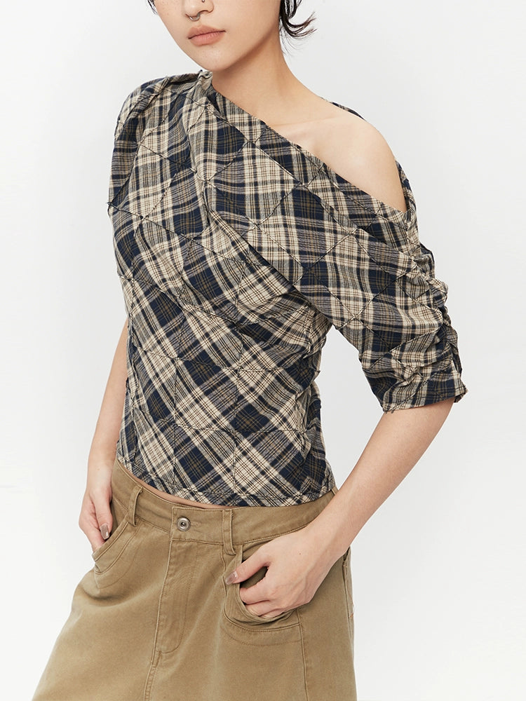 Pull col roulé ajusté à carreaux, décolleté épaule 