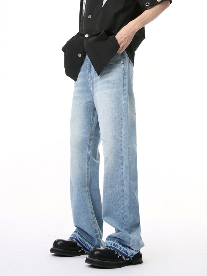 Mid-Waist Ripped Flared Jeans 