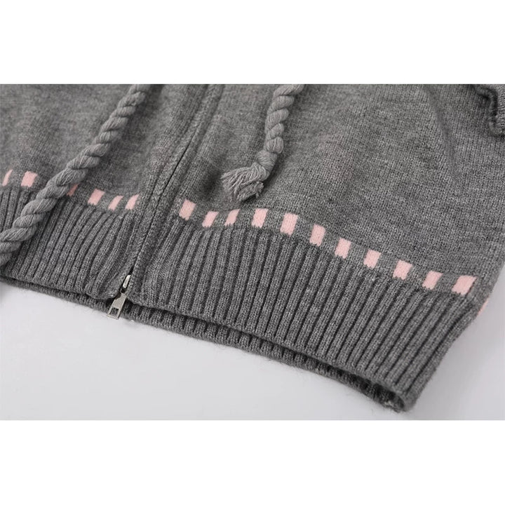 Cárdigan de punto jacquard con capucha de piel sintética 