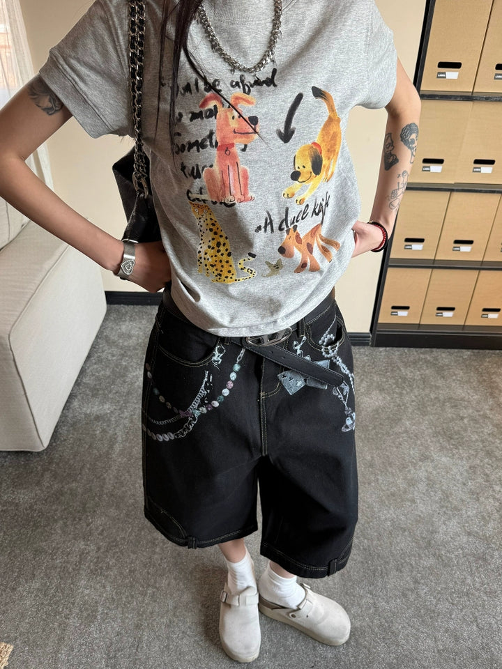Pantaloni cropped in denim con stampa a catena 