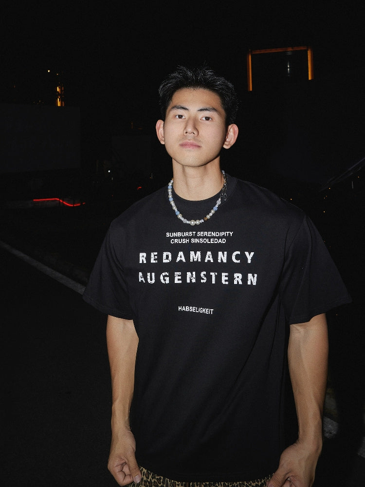 Suéter de manga corta suelto con estampado de letras 