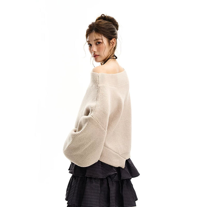 Avslappnad stickad tröja med off-shoulder 