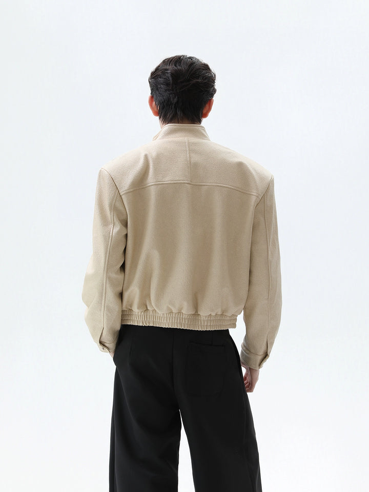 Chaqueta de PU con cuello alzado y bolsillos 