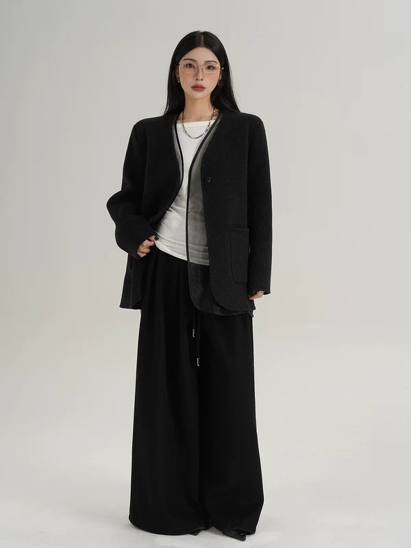 Пиджак из шерсти без воротника с карманами 