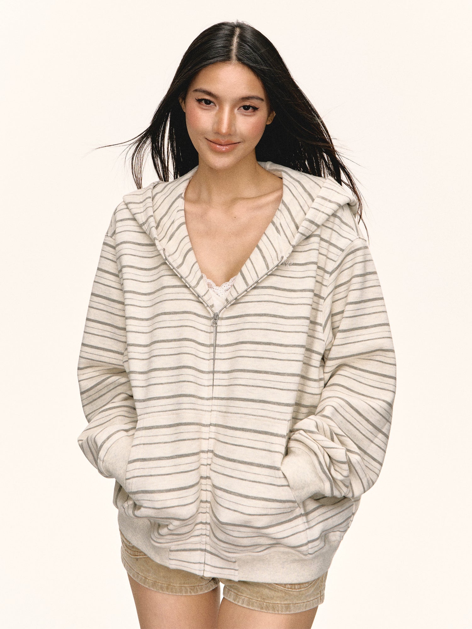 Cardigan con cappuccio a zip a righe 