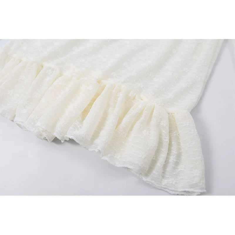 Top de peplum de encaje de manga larga con cuello alto 