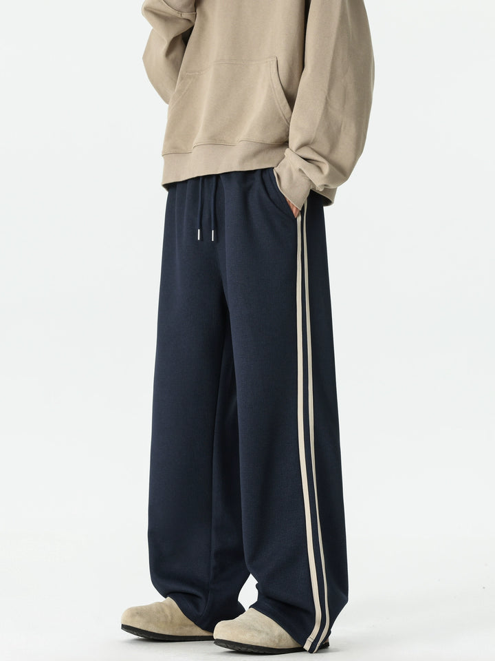 Pantaloni sportivi a gamba larga a righe retro 