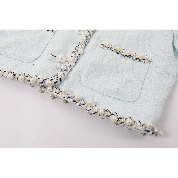 סט של ז'קט קצר מבד טוויד וחצאית 